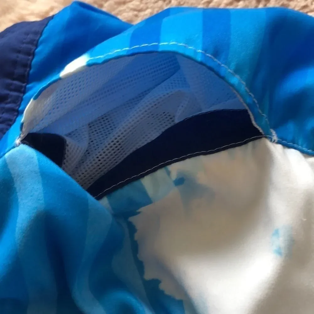 Corona bright color palm tree men’s swim trunks